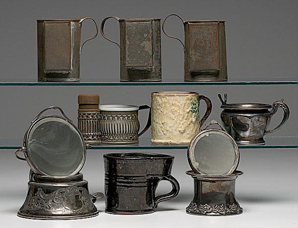 Appraisal: NINE SHAVING MUGS PRIMITIVES AND SILVER PLATE includes three tin