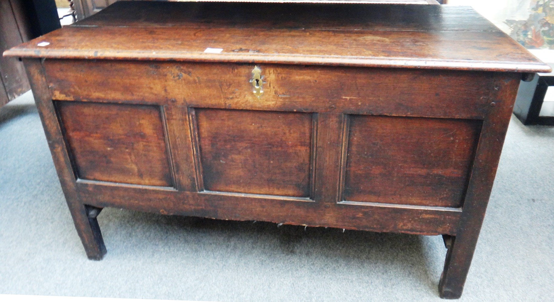 Appraisal: An th century oak coffer the plank top over a