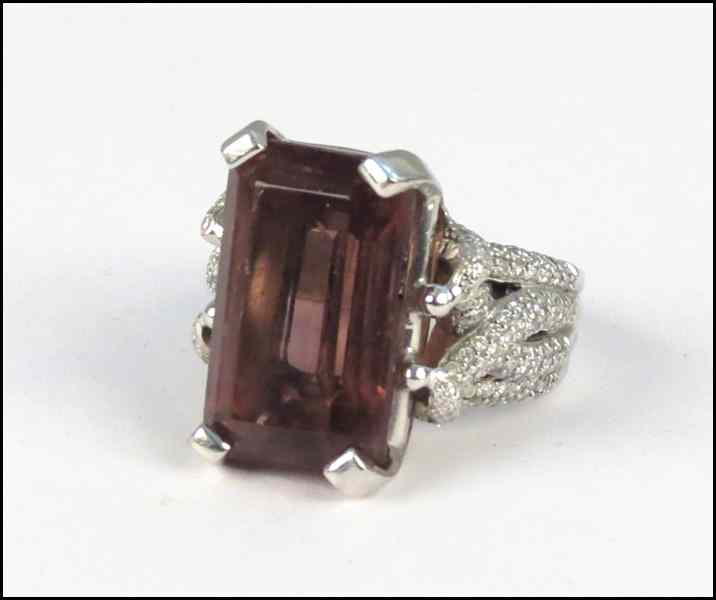 Appraisal: KARAT WHITE GOLD TOURMALINE AND DIAMOND RING Tourmaline is approximately