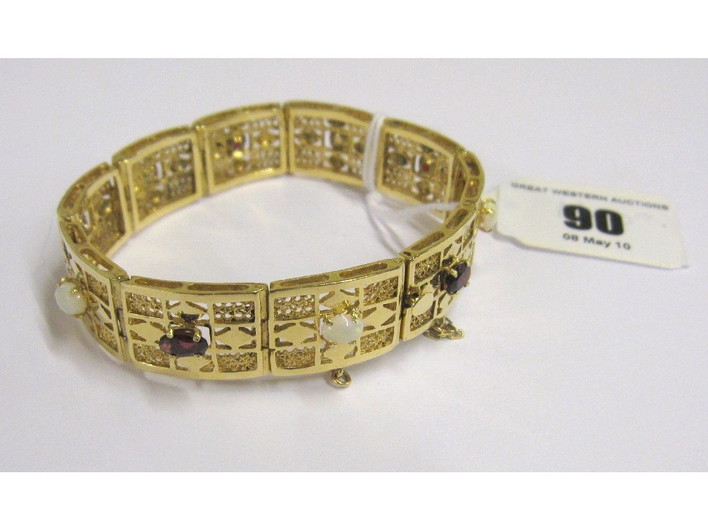 Appraisal: Fourteen carat gold opal and garnet set bracelet with ten