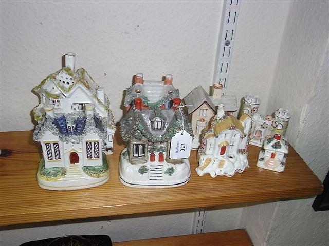 Appraisal: EIGHT STAFFORDSHIRE POTTERY PASTILLE BURNERS MONEY BOXES in the form