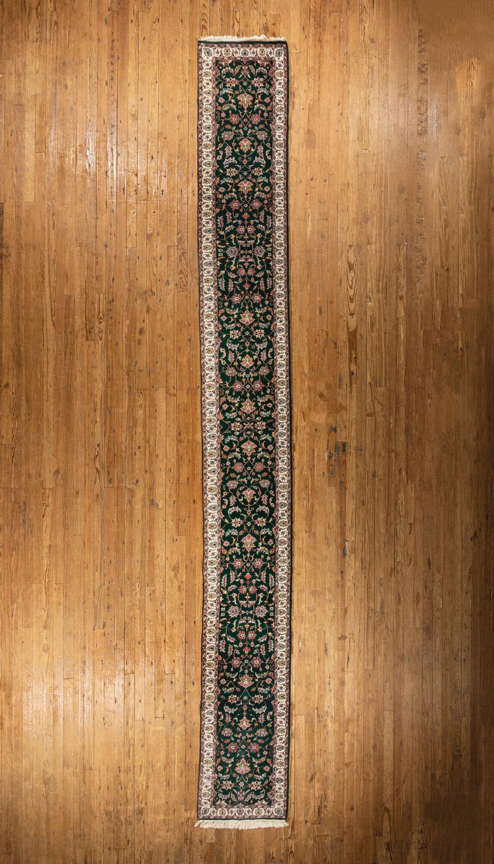 Appraisal: Indo Kashan Runner green ground vining floral design ft in