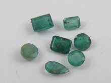 Appraisal: A quantity of loose polished emeralds approx ct