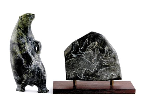 Appraisal: Eskimo carved stone sculptures DANCING BEAR H and WILDLIFE PANEL