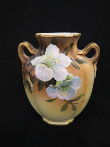 Appraisal: Nippon Handpainted Porcelain Vase floral satin handled signed excellent