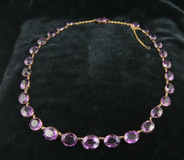 Appraisal: A Victorian Amethyst Riviere c the graduated oval shaped amethysts