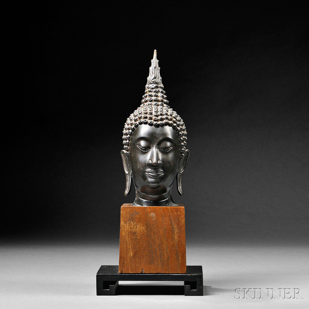 Appraisal: Bronze Sukhothai-style Buddha Head Thailand the oval face with arched