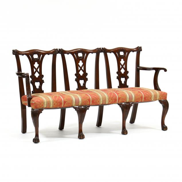 Appraisal: ENGLISH CHIPPENDALE STYLE TRIPLE BACK CARVED MAHOGANY SETTEE Early th