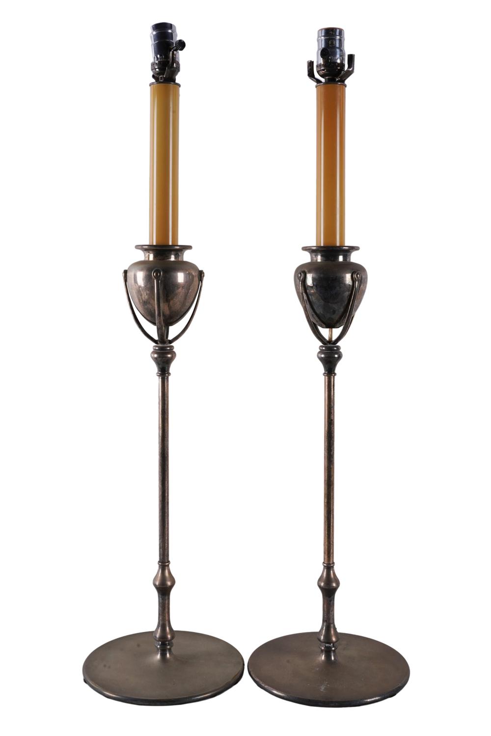 Appraisal: PAIR ARTS CRAFTS STYLE SILVERPLATE CANDLESTICKSunsigned mounted as table lamps