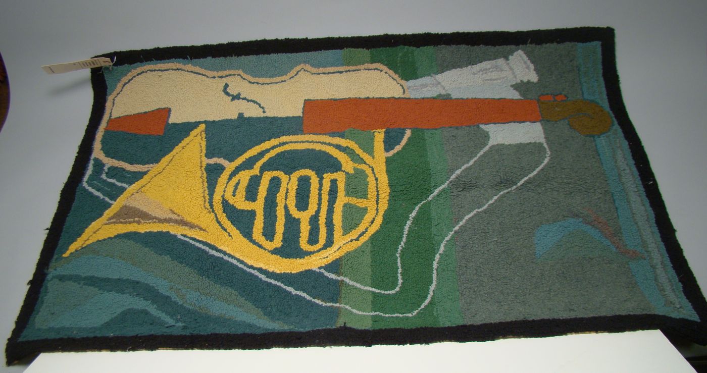 Appraisal: HOOKED RUG ' x ' Depicting a French horn in