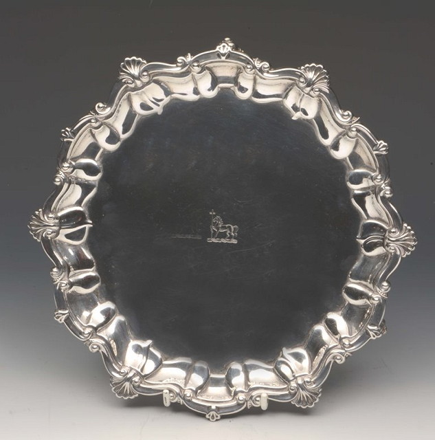 Appraisal: A GEORGIAN STYLE IRISH SILVER SALVER with raised border and