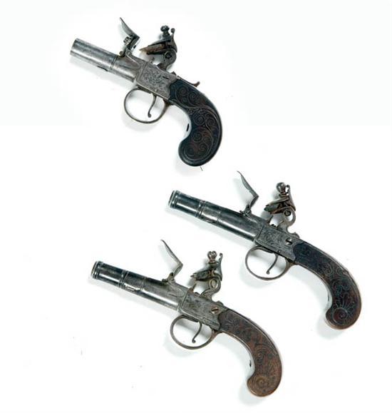 Appraisal: THREE SMALL FLINTLOCK PISTOLS England late th-early th century All