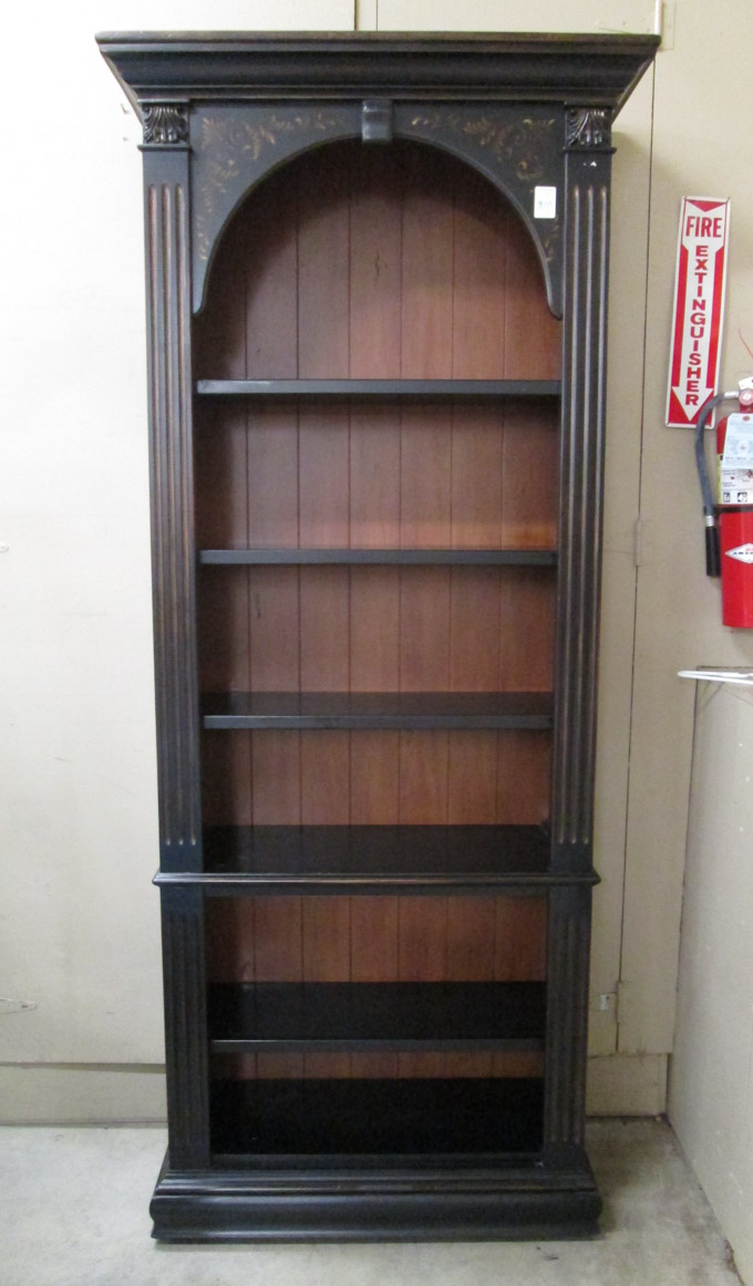 Appraisal: A TALL OPEN BOOKCASE having four adjustable open wood shelves