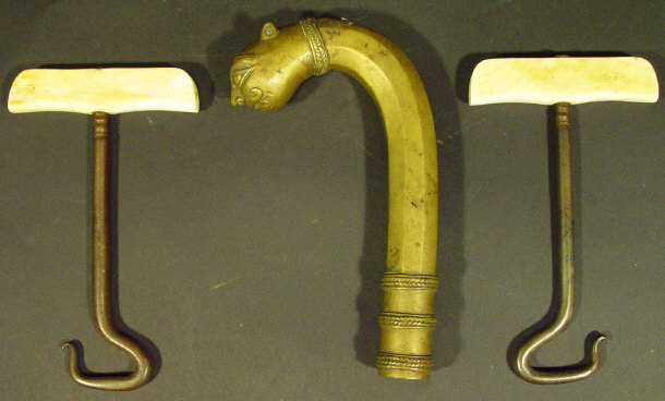 Appraisal: Middle Eastern brass walking cane handle together with two bone