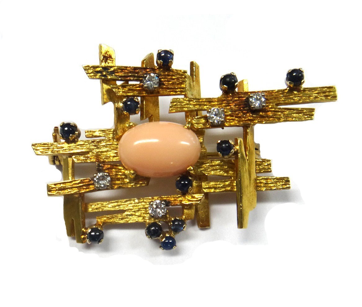 Appraisal: A gold diamond cabochon sapphire and coral set brooch in