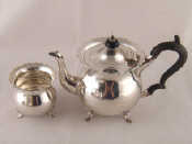 Appraisal: A silver bachelor teapot and sugar basin Chester Wt gms