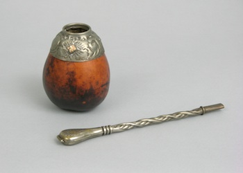 Appraisal: Argentinean Mate Tea Strainer and Container Containing hollowed-out gourd container