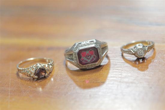 Appraisal: THREE RINGS Gentleman's Masonic ring marked '' K'' Size Ladies