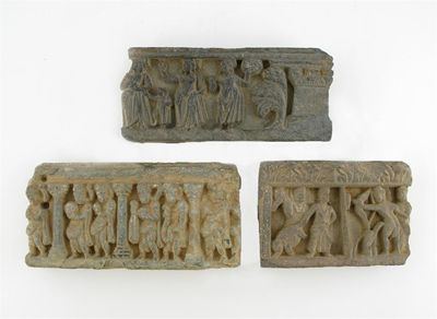 Appraisal: Three Gandh ra grey schist frieze sections depicting attendants an