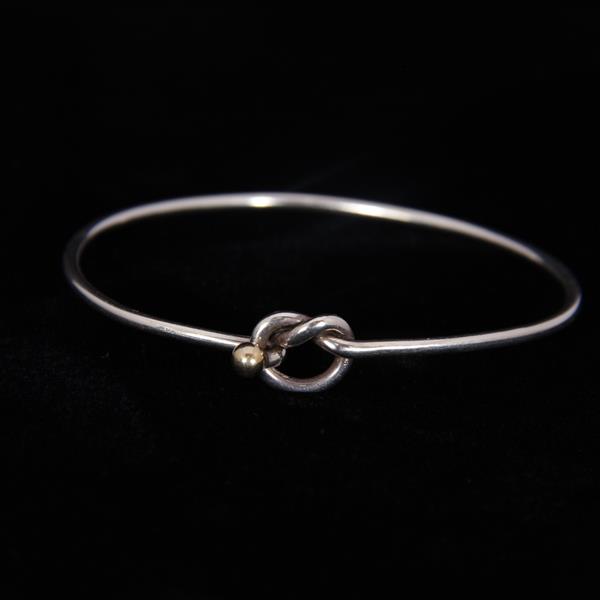 Appraisal: Tiffany Co Love Knot Sterling Silver and Gold Bangle Bracelet