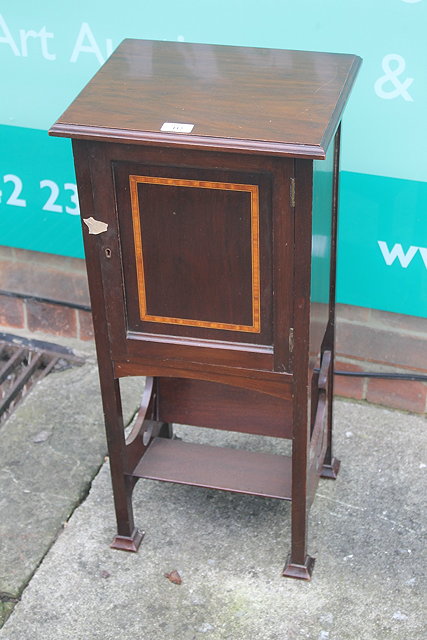 Appraisal: AN ART NOUVEAU MAHOGANY SMOKER'S CABINET the single inlaid cupboard