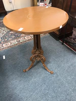 Appraisal: A circular mahogany table on a Victorian cast iron support