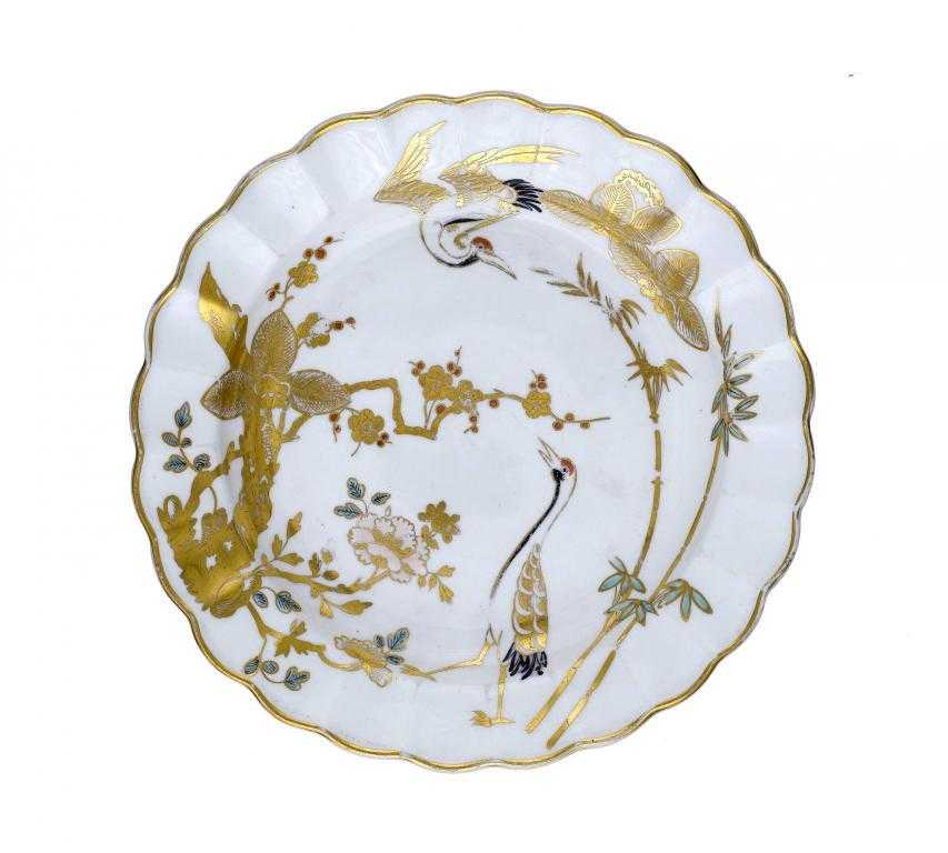 Appraisal: A DERBY FLUTED PLATE enamelled but principally gilt with the