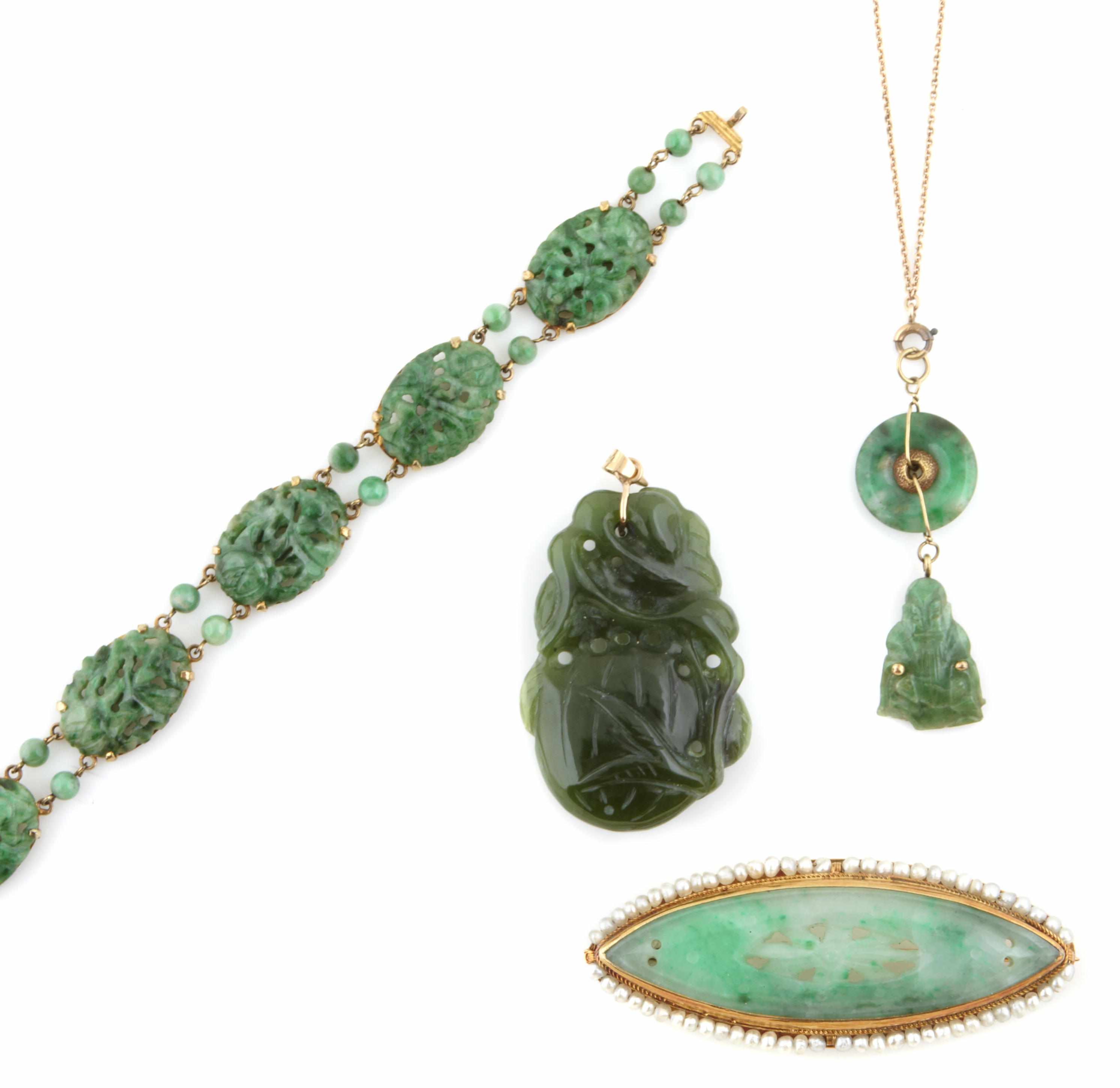 Appraisal: A group of four carved jade seed pearl and gold