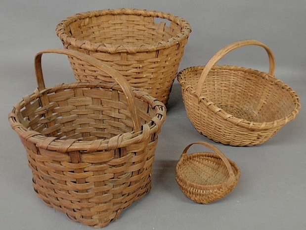 Appraisal: Four woven baskets th c largest h x dia smallest