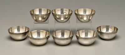 Appraisal: Eight middle eastern silver bowls lotus leaf form with round