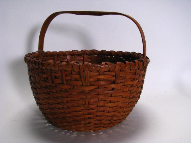 Appraisal: Antique woven gathering basket diameter