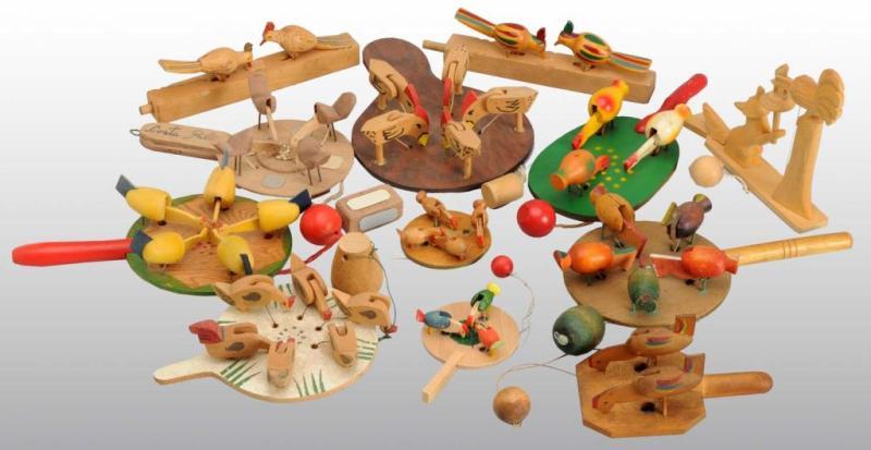 Appraisal: Lot of Wooden Animal Paddle Toys Description Includes toys with