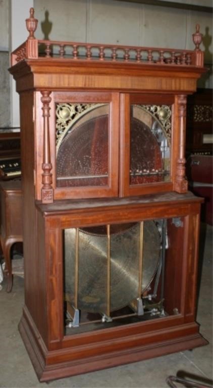 Appraisal: REGINA DISC MUSIC BOX CHANGER VICTORIANmahogany case with spindle gallery