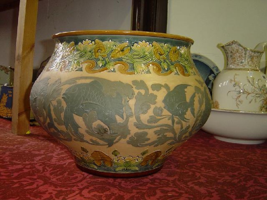 Appraisal: A large early th century Mettlach continental jardiniere with relief