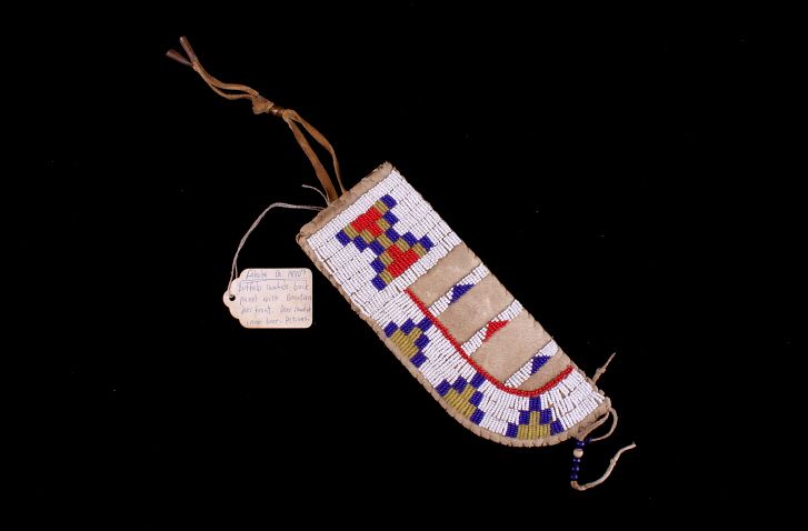 Appraisal: Lakota Sioux Beaded Buffalo Parfleche Knife Sheath Featured in this