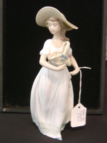 Appraisal: NAO BY LLADRO FIGURINE - GIRL W BASKET