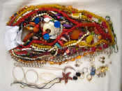 Appraisal: A mixed lot of beaded costume jewellery together with white