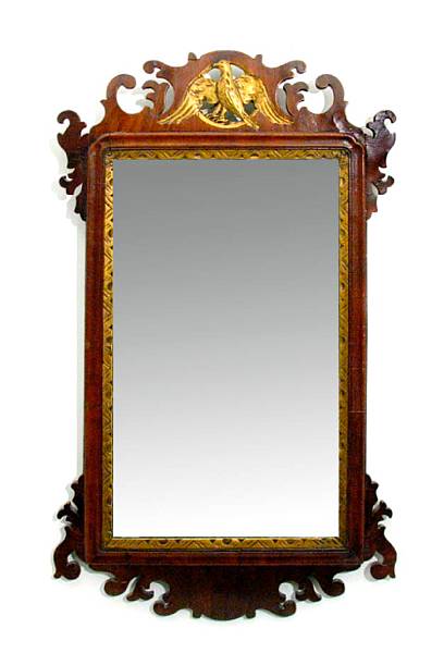 Appraisal: A Chippendale style mahogany mirror surmounted by a giltwood eagle