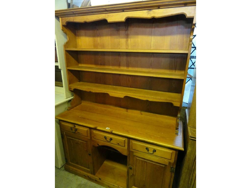 Appraisal: A modern stripped pine kitchen dresser by Younger Furniture London