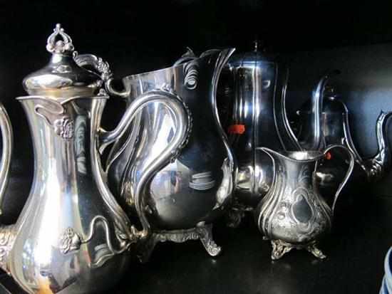 Appraisal: HALF A SHELF OF SILVER PLATE INCLUDING TEAPOTS JUGS ETC