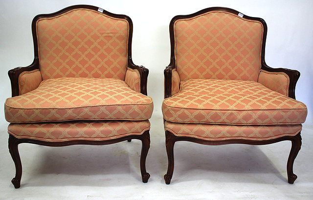 Appraisal: A PAIR OF LOUIS XVI STYLE HARDWOOD FRAMED ARMCHAIRS in