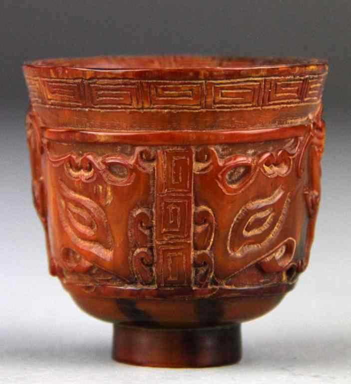 Appraisal: Chinese Qing Carved Horn Libation CupFinely carved to depict Chilong