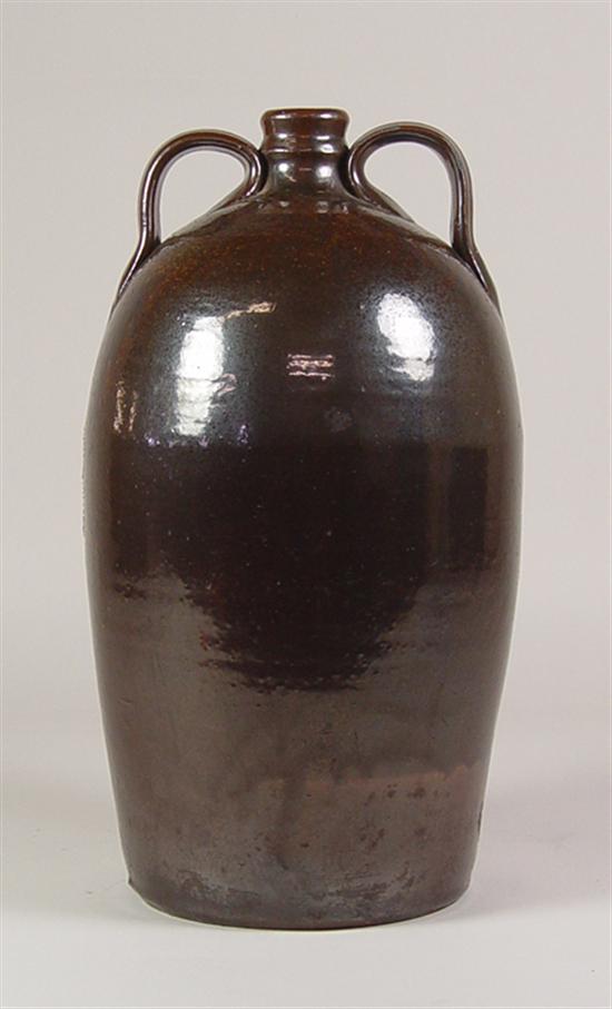 Appraisal: Southern Two-Handled Ovoid Jug Circa Brown glaze as found in