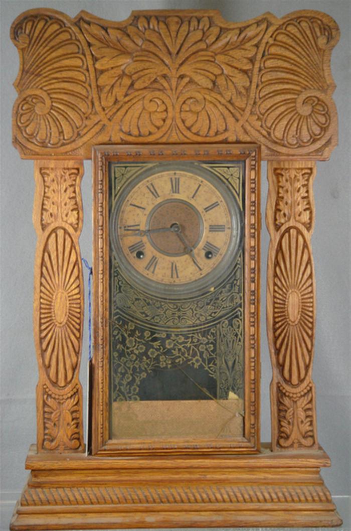 Appraisal: Ingraham pressed oak kitchen clock cracked door glass movement loose