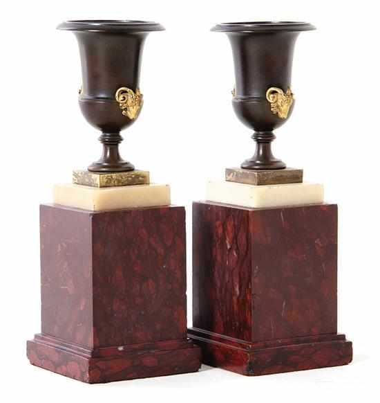 Appraisal: Pair miniature French bronze urns on rouge marble base th