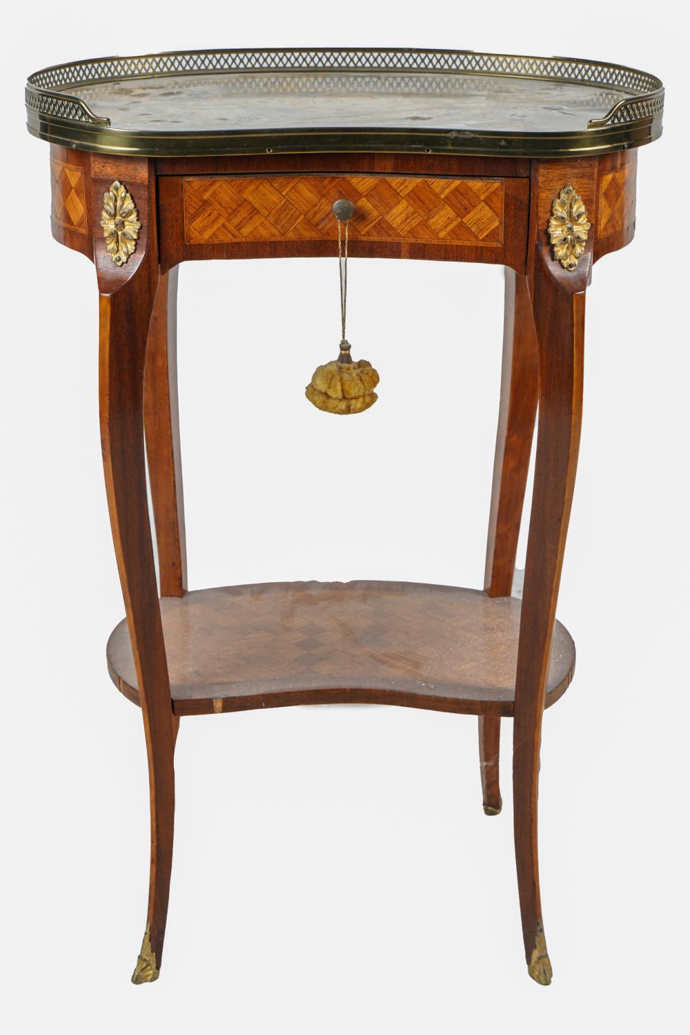 Appraisal: FRENCH PARQUETRY-INLAID OCCASIONAL TABLEthe kidney-shaped marble top above a single