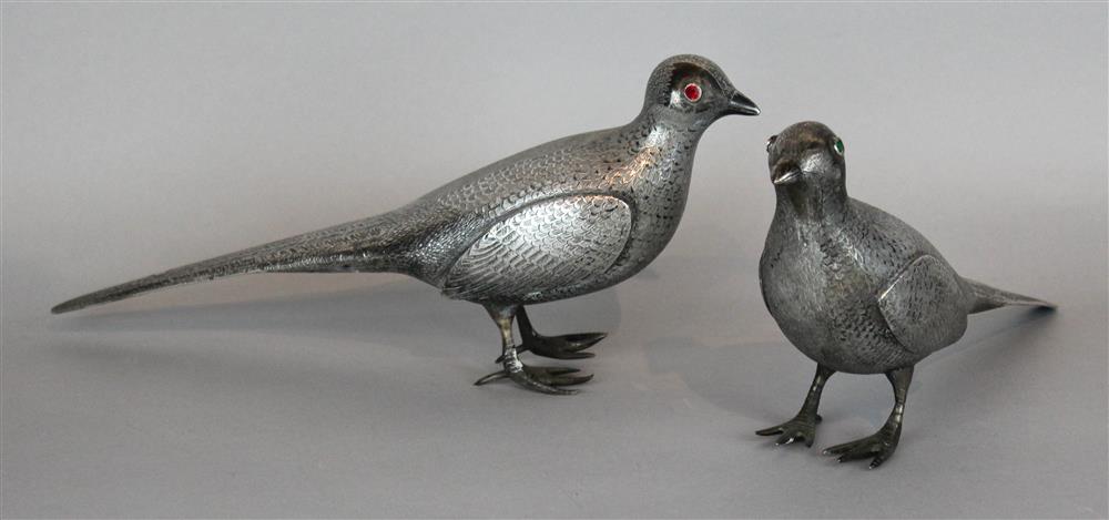 Appraisal: PAIR OF PERSIAN SILVERED METAL PIGEONS both marked under feet