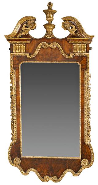 Appraisal: A George II parcel gilt walnut mirror of American interestsecond