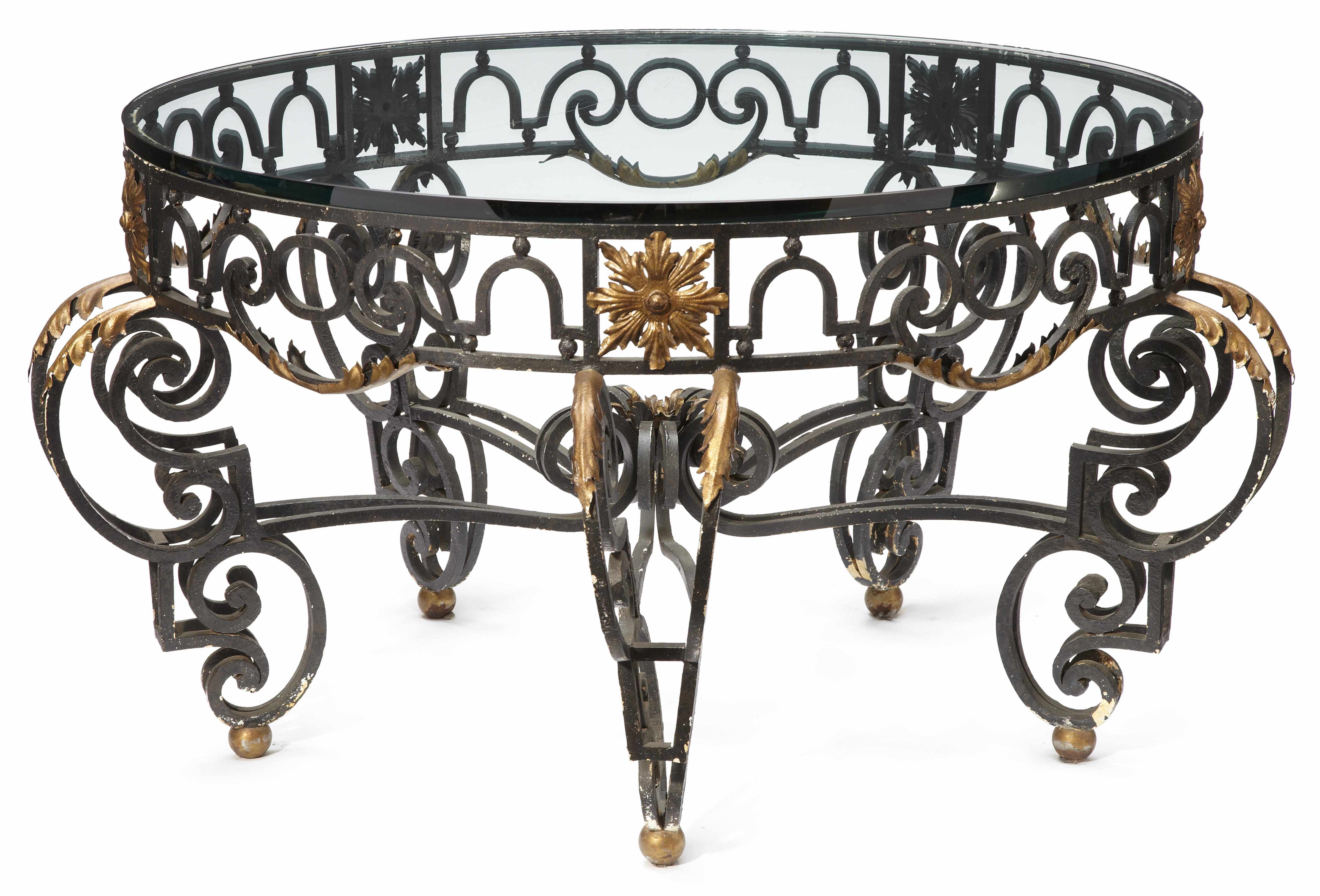 Appraisal: A Continental Baroque style parcel gilt wrought iron center table