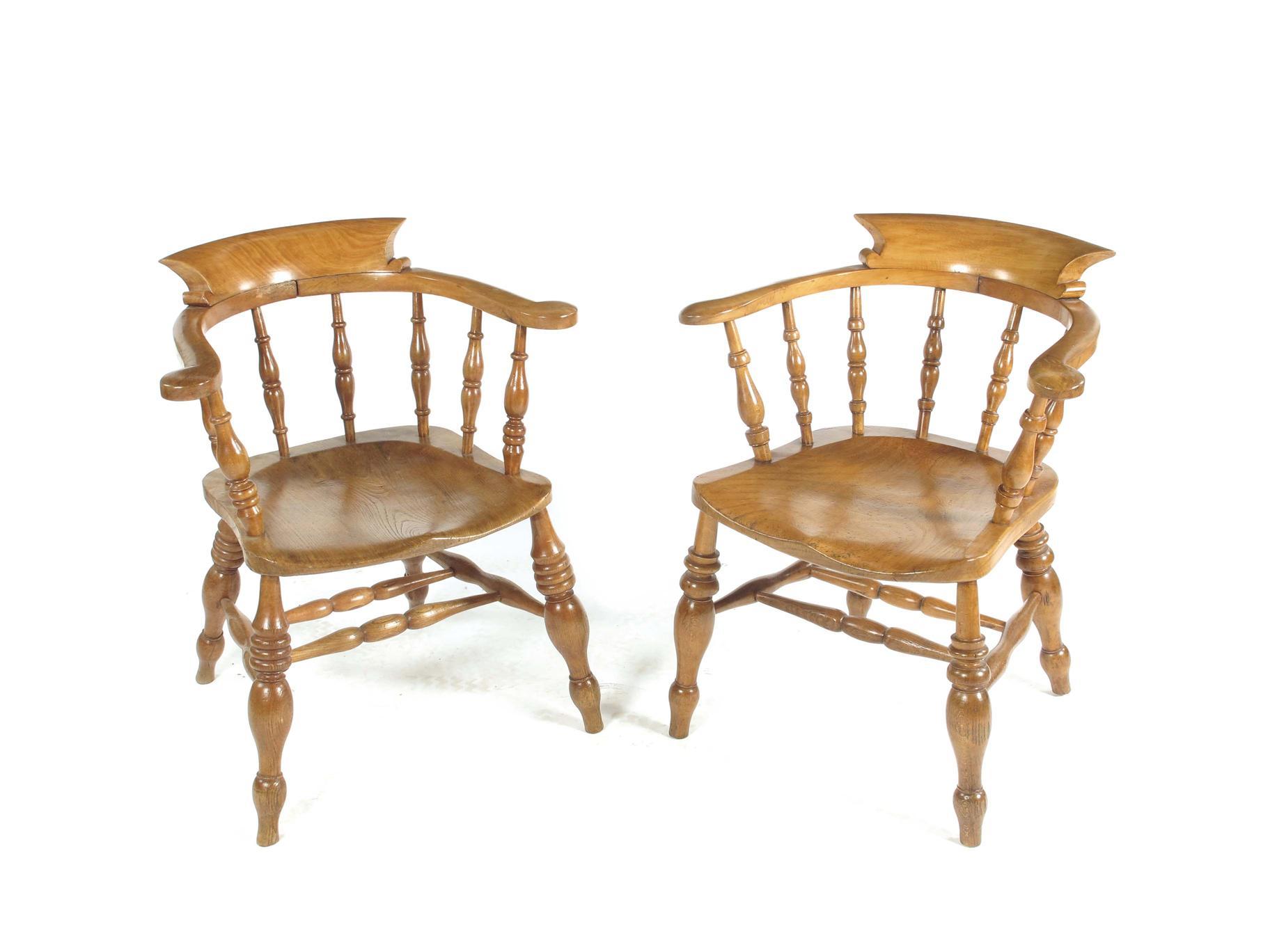 Appraisal: A late Victorian beechwood and elm smoker s bow armchair